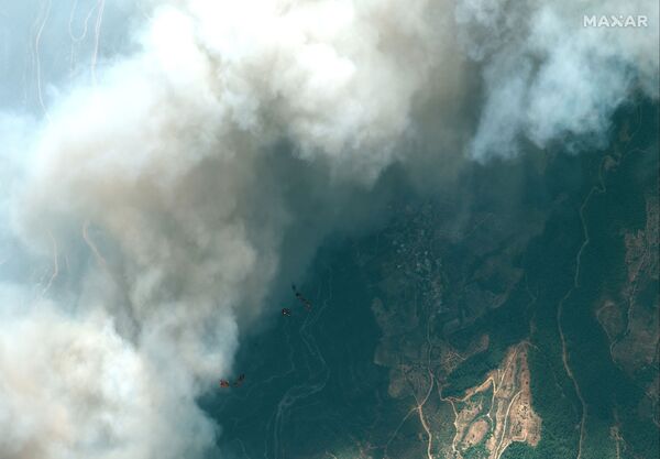 Muğla'nın Marmaris ve Antalya'nın Manavgat ilçelerindeki orman yangınlarını söndürme çalışmaları devam ediyor
 - Sputnik Türkiye