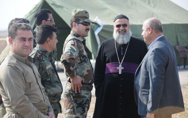 Musul operasyonu devam ederken Musullu Hristiyanlar da Irak ordusu ve Peşmerge'ye destek veriyor. - Sputnik Türkiye
