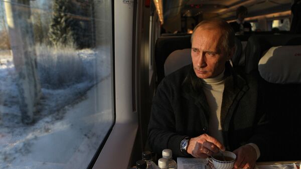 Vladimir Putin takes trip on newly launched Sapsan high-speed train - Sputnik Türkiye