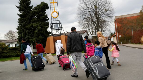 Almanya'da kampa yerleştirilen göçmenler - Sputnik Türkiye
