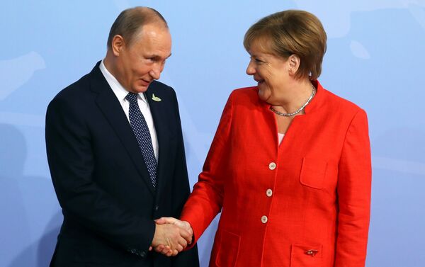 G20 Liderler Zirvesi, Hamburg'da başladı: Angela Merkel ve Vladimir Putin - Sputnik Türkiye