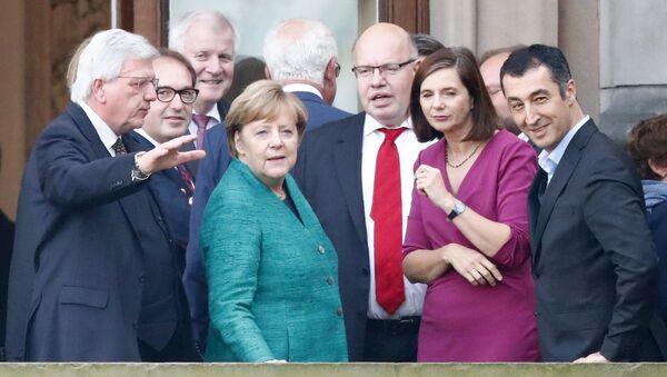 Almanya Başbakanı Angela Merkel ile Yeşiller Partisi Eş Başkanı Cem Özdemir - Sputnik Türkiye