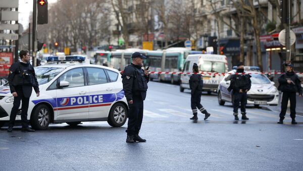 French police secure the area after a man was shot dead at a police station in the 18th district in Paris, France January 7, 2016 - Sputnik Türkiye