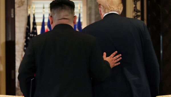 Kim Jong Un ve Donald Trump - Sputnik Türkiye