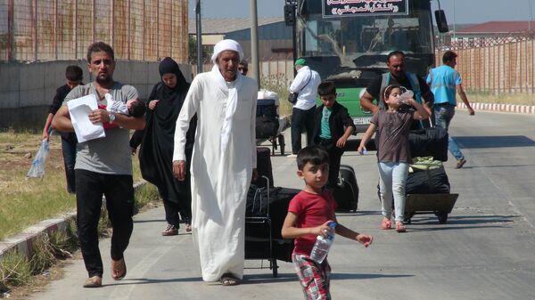 Bayram ziyaretine giden 49 bin Suriyeli döndü - Sputnik Türkiye