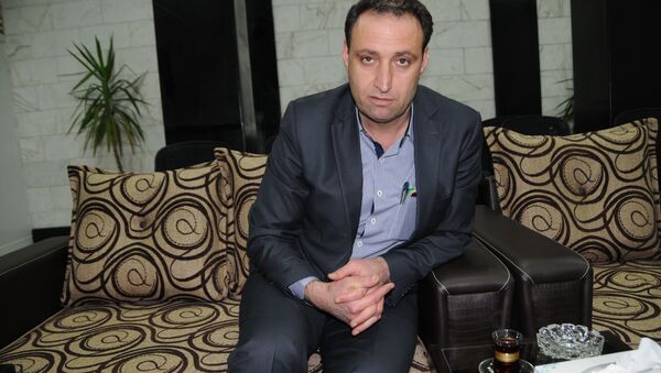 Demokratik Suriye Meclisi yöneticisi Ekrem Husso - Sputnik Türkiye