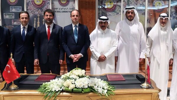 Türkiye Cumhuriyet Merkez Bankası ile Katar Merkez Bankası arasında Doha’da düzenlenen törenle ikili Para Takası (Swap) Anlaşması imzalandı. - Sputnik Türkiye