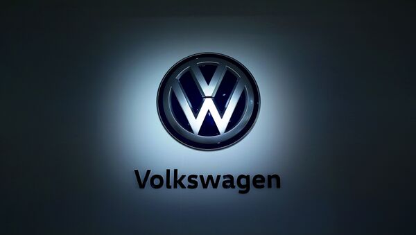 The logo of German carmaker Volkswagen (VW) is pictured at the company's head quarters on November 22, 2016 in Wolfsburg, northern Germany.  - Sputnik Türkiye