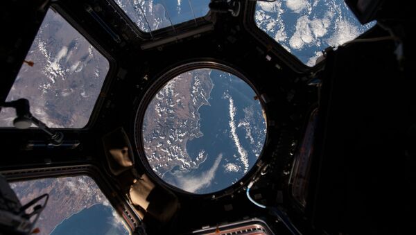 NASA astronaut Scott Kelly on the International Space Station took this Earth observation photo in the stations cupola that provides a 360 degree view. He tweeted this image with the comment: The view out my window.  - Sputnik Türkiye