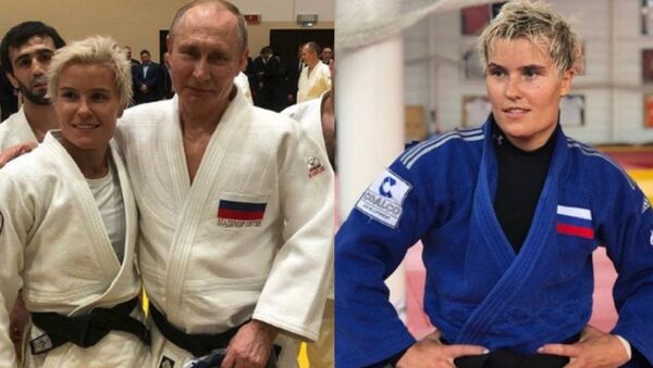 Rusya Devlet Başkanı Vladimir Putin ile şubatta Soçi’de birlikte judo yapan 30 yaşındaki Rus sporcu Natalya Kuziutina - Sputnik Türkiye